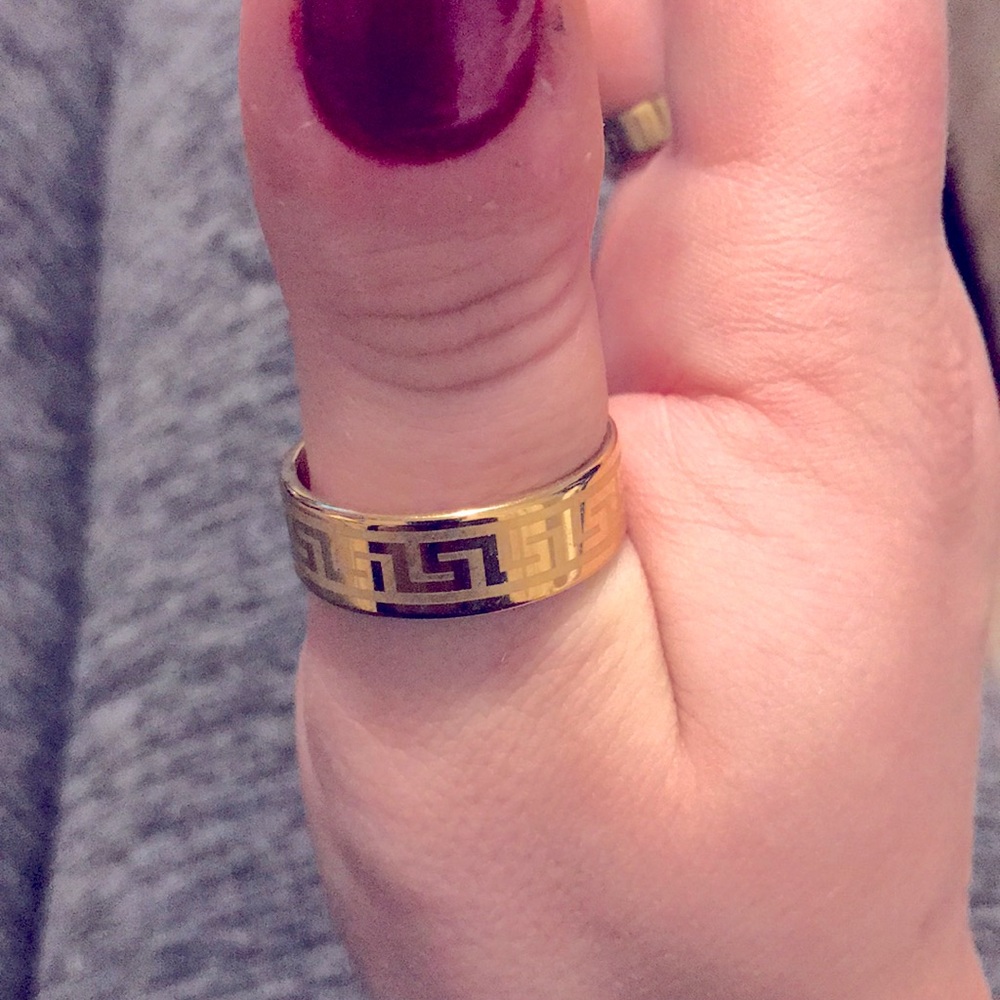GIVENCHY Gold size 10 steel gold ring